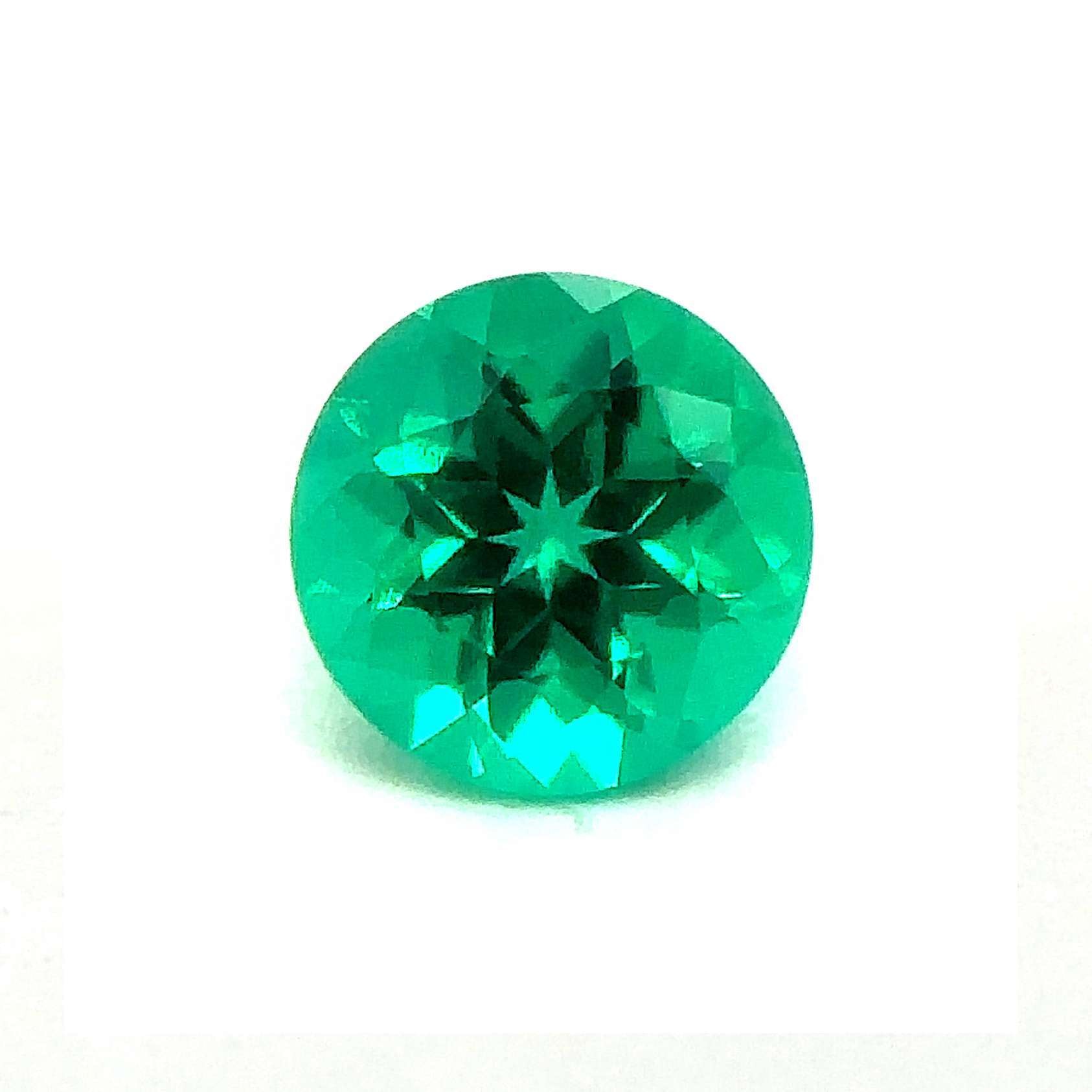 Japan Lab Gem Round Medium Colombian Emerald